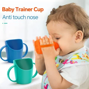 baby learns to drink water cup